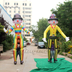 front of walking colorful inflatable clown puppet