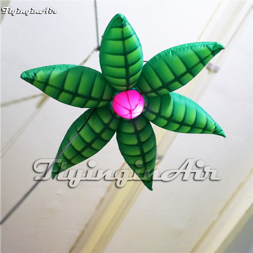 Green inflatable flower decoration with center light, ideal for stage, party, or event hanging display for weddings, malls.