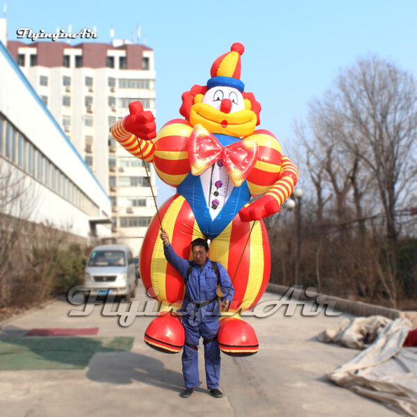 front of waving inflatable joker puppet