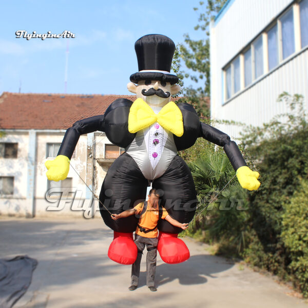 front of black inflatable clown puppet