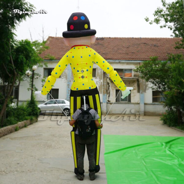 back of yellow inflatable clown puppet