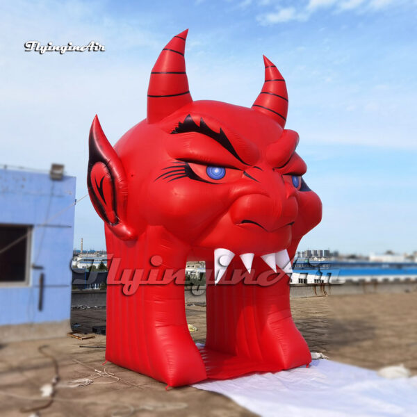 red inflatable devil head tunnel