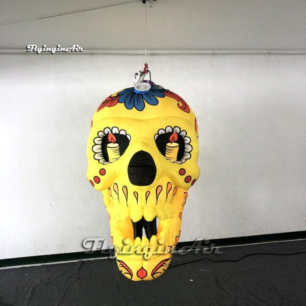 hanging yellow inflatable skull
