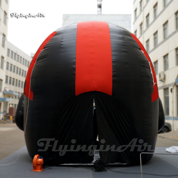 back of black inflatable football helmet tunnel