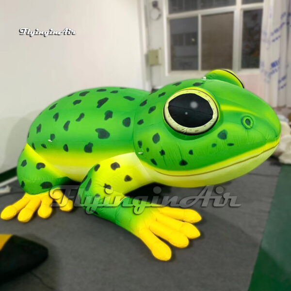 side of green inflatable frog