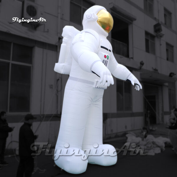 side of inflatable astronaut with golden helmet