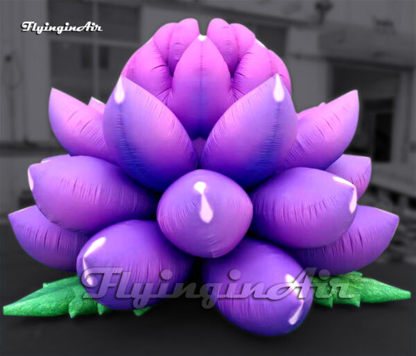 purple inflatable flower on ground