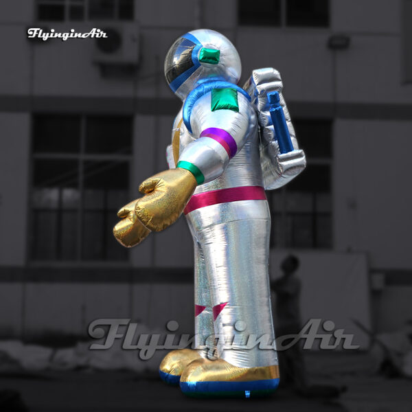 side of shiny standing inflatable astronaut