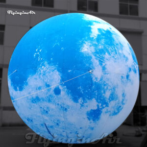 large blue inflatable moon balloon