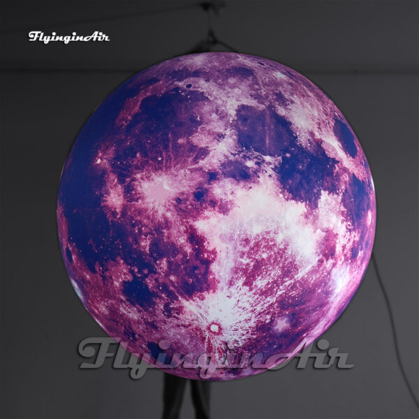 hanging purple inflatable moon balloon