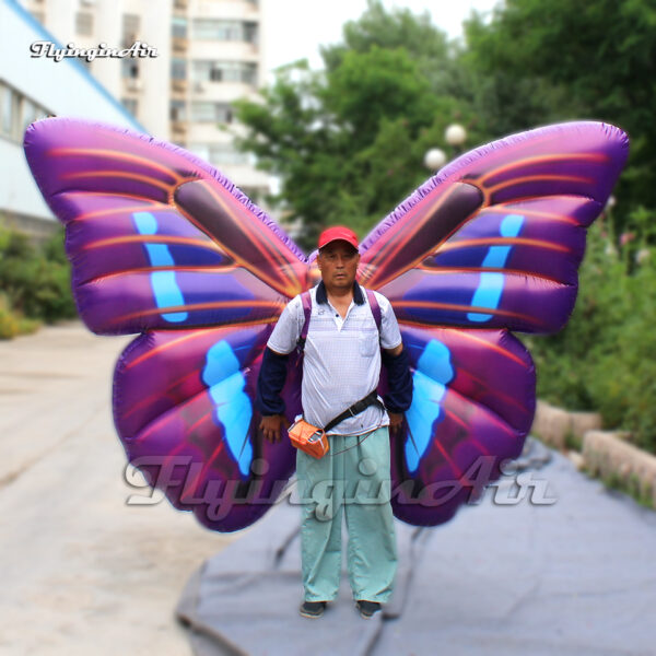 purple inflatable butterfly wings