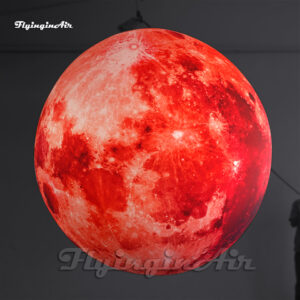 red inflatable moon balloon