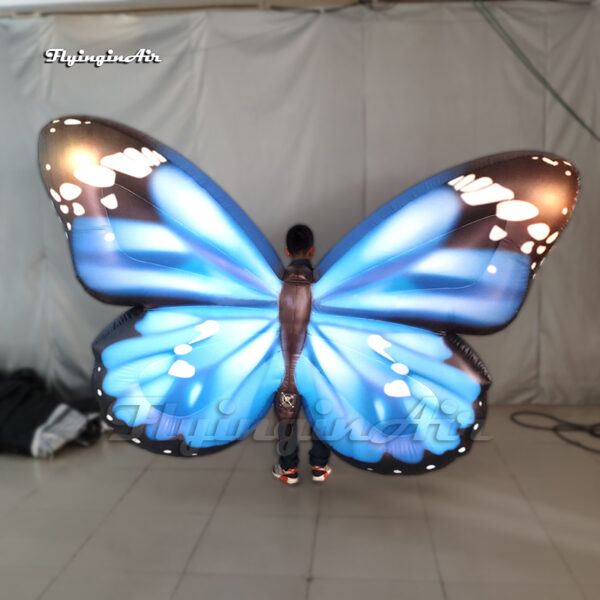 blue walking blow up butterfly wing with light