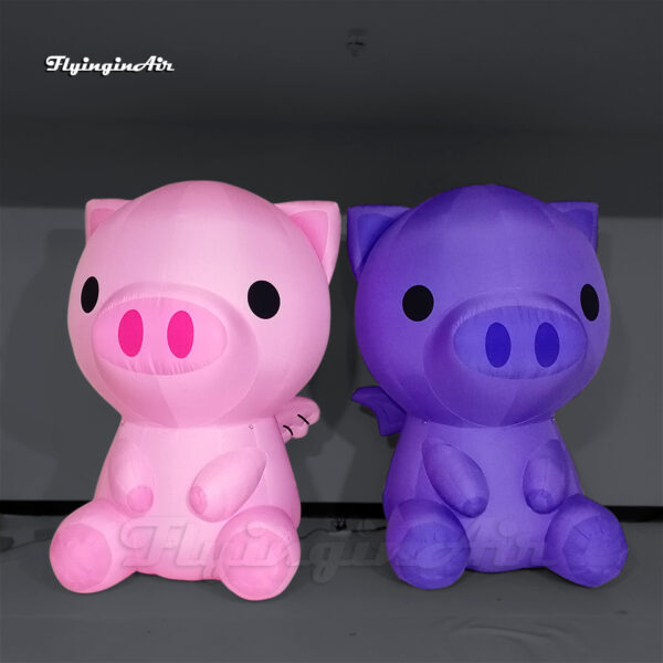 inflatable pink pig and inflatable purple pig