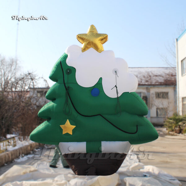 green inflatable christmas tree with star on the top