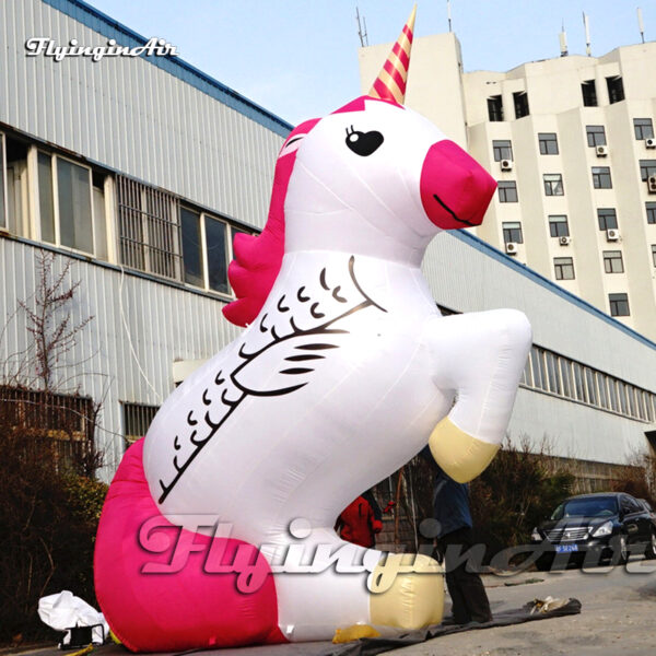 inflatable unicorn balloon with pink tail