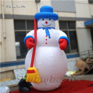 giant inflatable snowman with broom