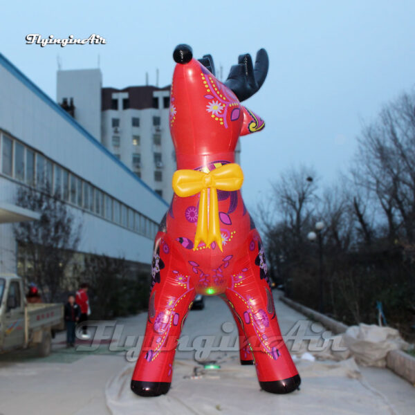 large red inflatable cartoon christmas reindeer