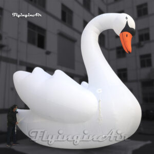 large-white-inflatable-swan-balloon-red-neb