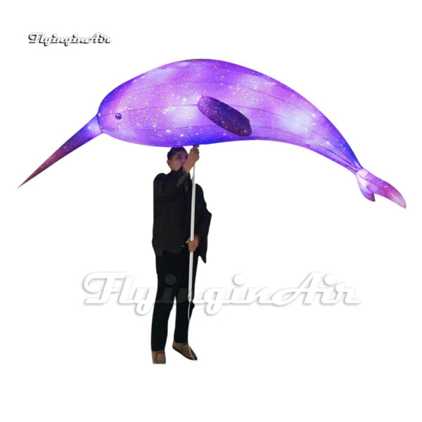 3m purple holding inflatable narwhal puppet