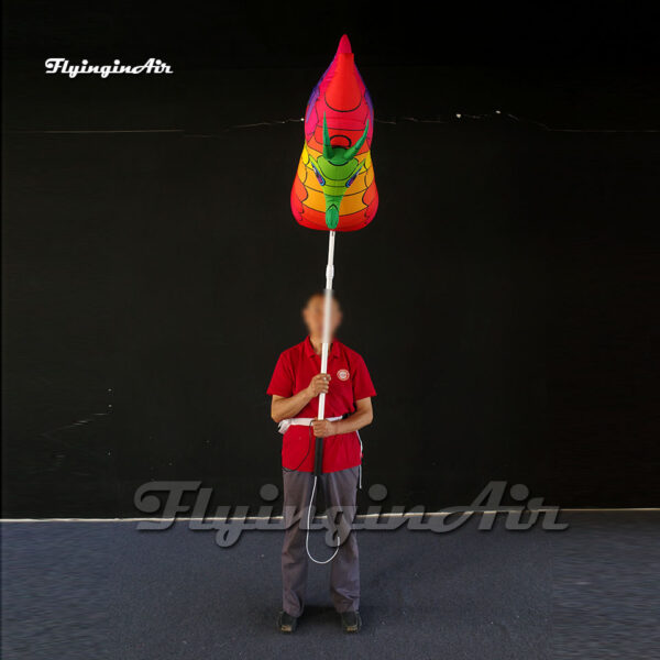 parade holding inflatable seahorse balloon