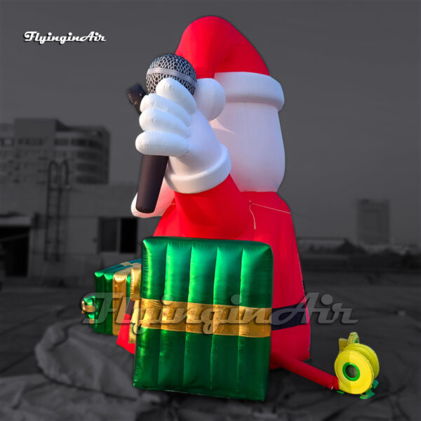 red giant inflatable santa with gift box