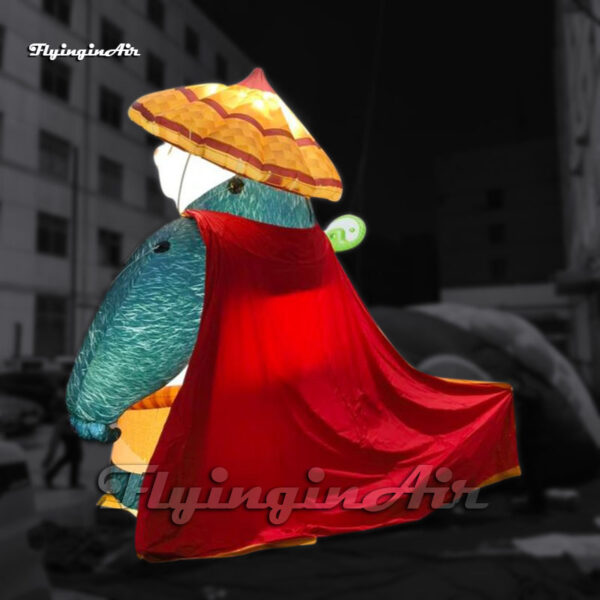 giant inflatable kung fu panda Po with a red cape