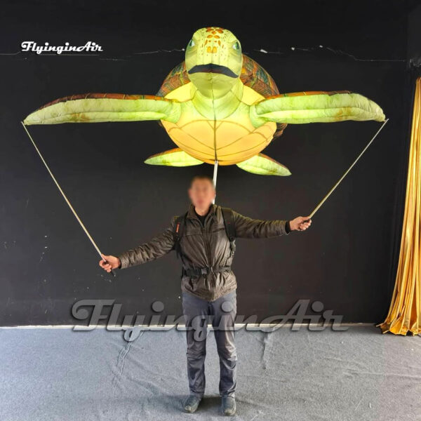 holding inflatable sea turtle puppet with led light for parade