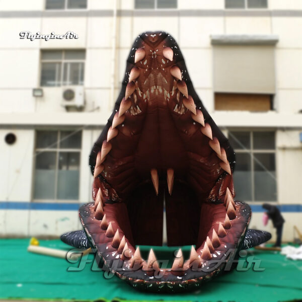 giant inflatable dinosaur Mosasaur head tunnel