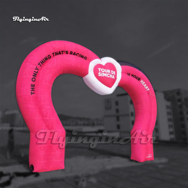 pink inflatable arch with a big heart for advertising show