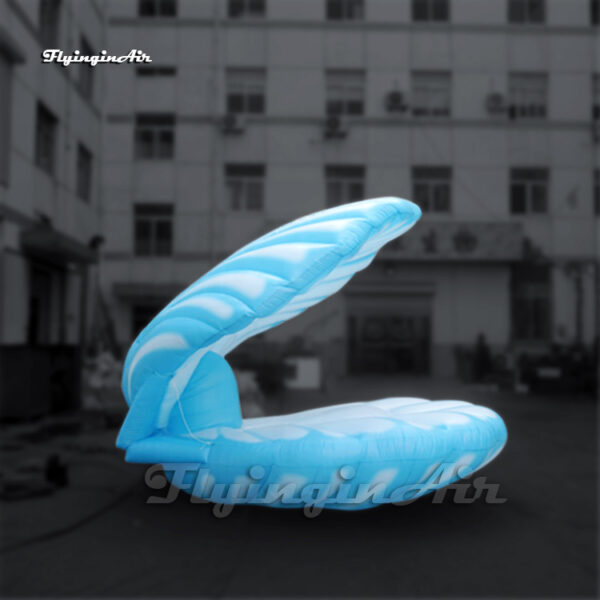 stage prop blue inflatable mussel shell that people can stand inside