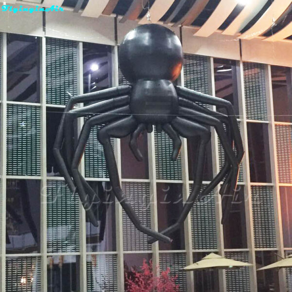 hanging black inflatable spider for building