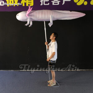 cute holding giant inflatable Axolotl puppet for parade show