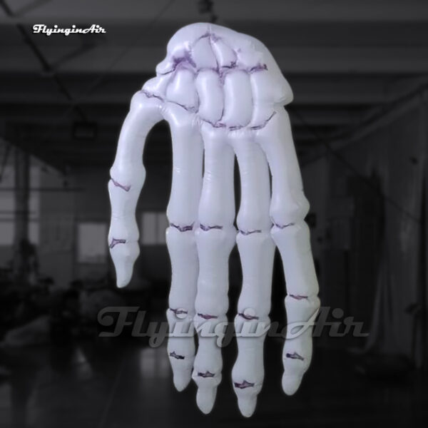 scary white giant inflatable hand bone