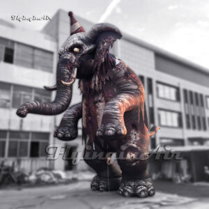 A bloodied giant inflatable circus elephant in a standing position1