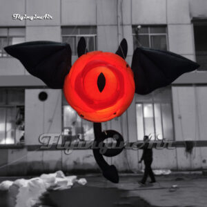 hanging red giant inflatable eyeball with wings