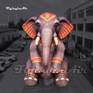 giant inflatable circus elephant sitting on the ground
