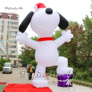 6m High Giant Inflatable Snoopy Cartoon Dog Wearing A Christmas Hat With A Gift Box For Outdoor Yard Decoration