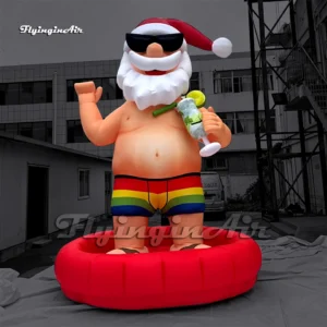 6m Giant Inflatable Summer Santa Claus with Sunglasses, Rainbow Swim Trunks and Cocktail in a Red Inner Tube for Beach Party Decoration