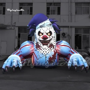Front view of a 6m giant inflatable bloody clown zombie with sharp claws and a scary smile, ideal for Halloween and haunted house decorations.