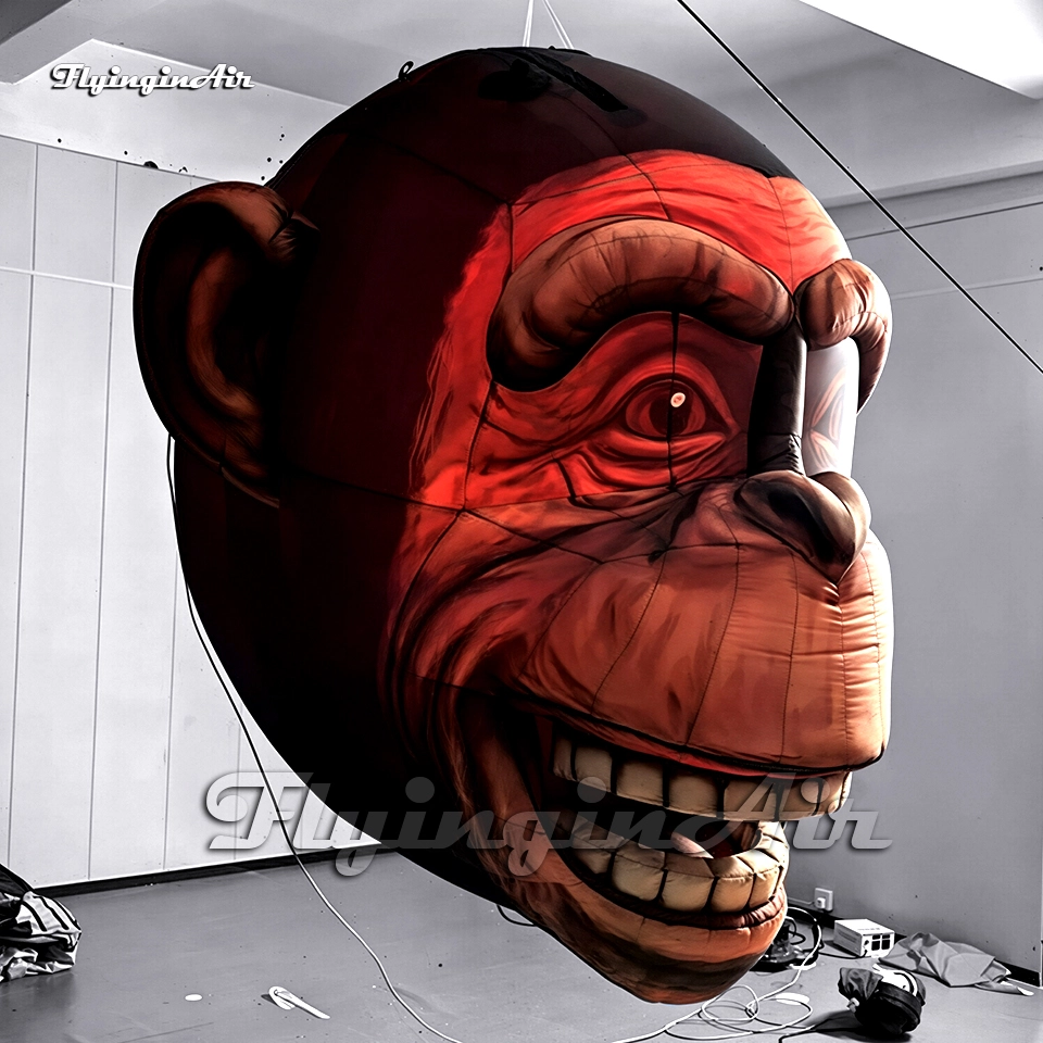 Side profile of a custom inflatable monkey head model with a big smile and realistic teeth, available for wholesale and events.