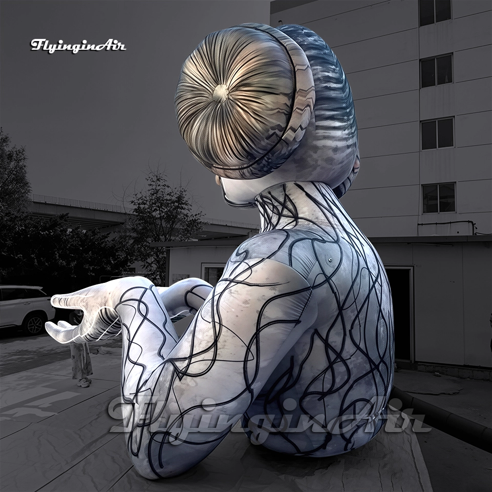 Back view of a giant inflatable artistic sculpture showing the detailed hair bun and line art construction, perfect for outdoor advertising.