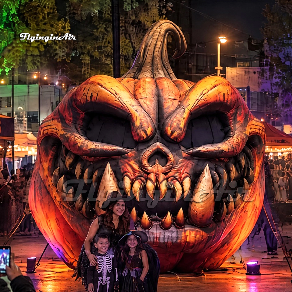 Front view of a 5m scary giant inflatable pumpkin monster head with sharp teeth and glowing eyes, ideal for Halloween events and haunted houses.