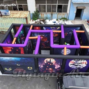 Interior view of a giant inflatable Halloween maze with detailed spooky graphics and obstacles, perfect for outdoor events.