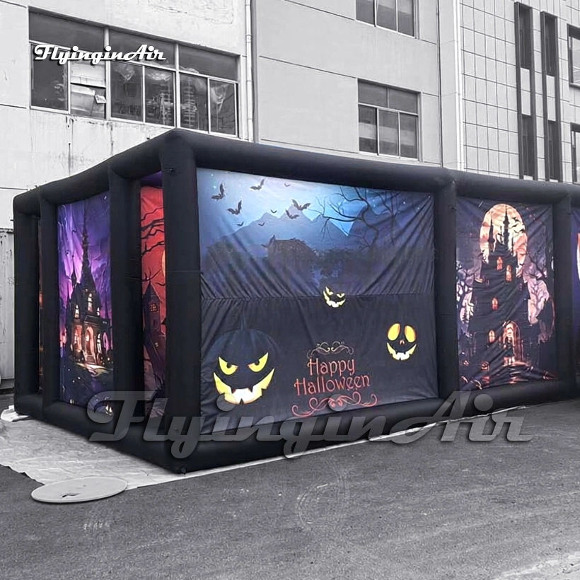 Close-up of a giant inflatable Halloween maze showing realistic pumpkin and castle printing, ideal for mall decorations.